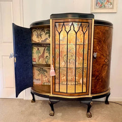 Antique drinks cabinet with illuminated central display section