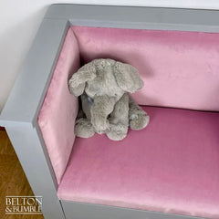 Close-up of velvet chair on reading set