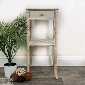Front view of faux bamboo bedside table with single drawer and lower shelf by Belton & Bumble