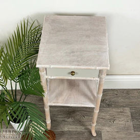 Top view of faux bamboo bedside table with single drawer and lower shelf by Belton & Bumble