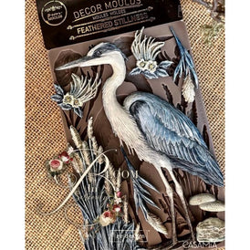 Decorative heron appliqué pieces made using Feathered Stillness silicone mould by Redesign with Prima, painted and finished for furniture decoration
