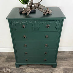 Top view of jewel green chest of drawers with five full-width drawers by Belton & Bumble