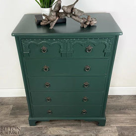 Top view of jewel green chest of drawers with five full-width drawers by Belton & Bumble
