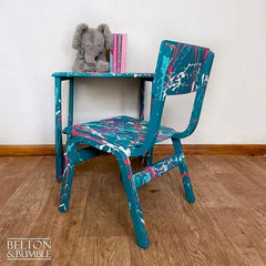 Angled view showing hand-painted Paintsplat finish on children’s table & chair set