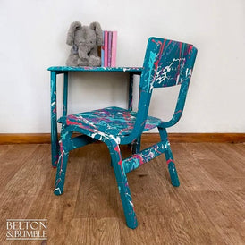Angled view showing hand-painted Paintsplat finish on children’s table & chair set