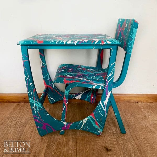 Side profile showing compact, sturdy construction of teal kids table & chair