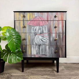 Hand-painted mid-century chest of drawers in jet black by Belton & Bumble, vintage display piece front view