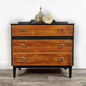 Front view of mid-century modern chest of drawers in jet black with teak fronts by Belton & Bumble