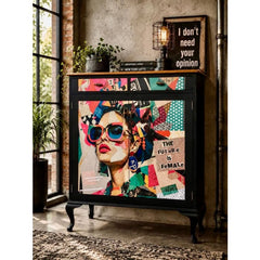 A black upcycled cabinet decorated with Mint by Michelle Cut & Paste Decoupage Paper, shown in a loft-style room with exposed brick and industrial-style windows.