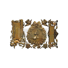 Ombres Florales silicone mould by Redesign with Prima unpainted cast appliqué pieces showing ornate baroque frames, cherubs and floral details for furniture upcycling and décor