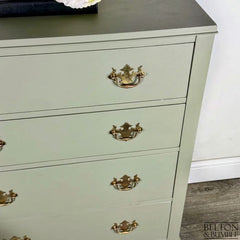 Detail of original handles with natural patina on Arcadia Pear mahogany chest by Belton & Bumble