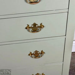 Detail of original handles with natural patina on Arcadia Pear mahogany chest by Belton & Bumble