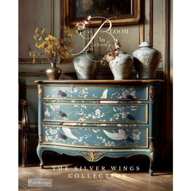 Silver Wings Decor Transfer by Redesign with Prima applied to chest of drawers featuring crane and blossom design