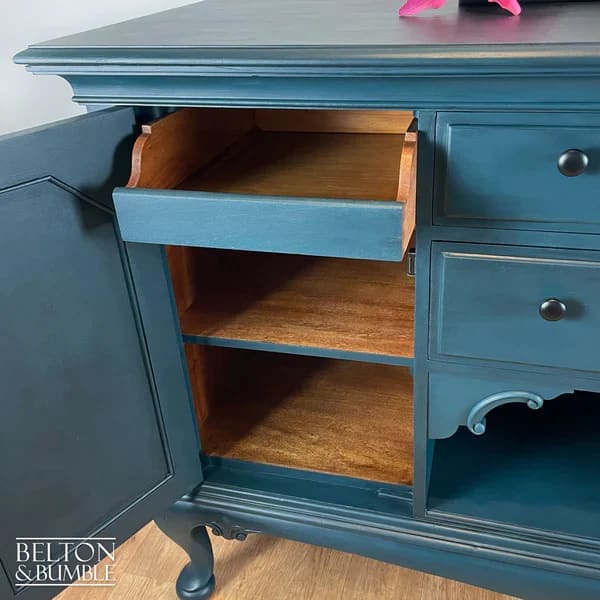 Interior of sideboard showing removable shelving
