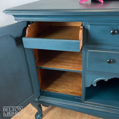 Interior of sideboard showing removable shelving