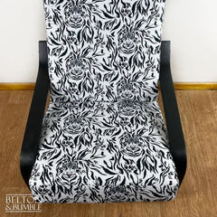 Close-up of tiger print upholstery on vintage rocking chair seat by Belton & Bumble, UK