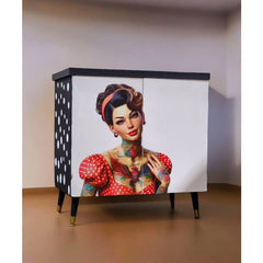 Pinup A1 furniture decoupage paper by Three Yellow Goats with rockabilly-inspired artwork on a vintage mcm cabinet