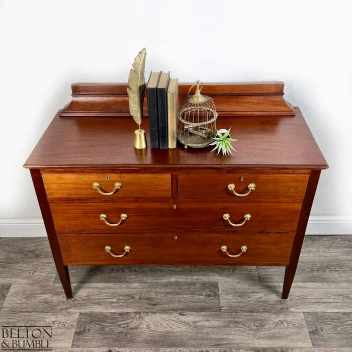 Top surface and gallery back of restored mahogany chest of drawers